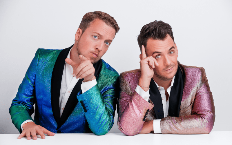 Michael and Robert from dueling pianos, two men in colorful dinner jackets looking at the camera